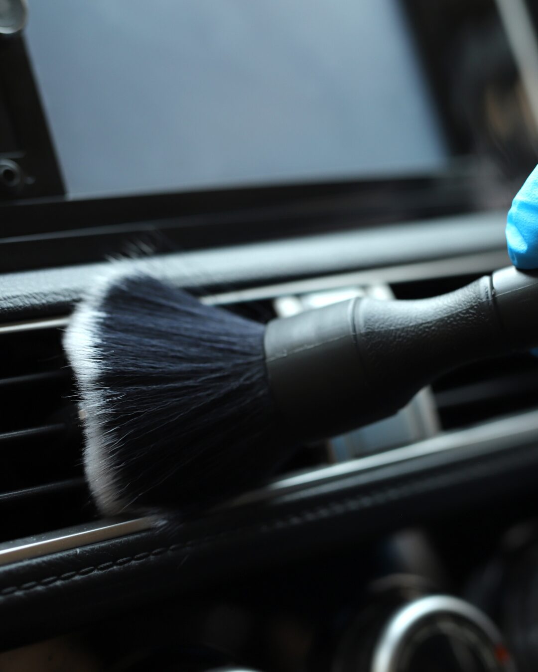 Technician cleaning vehicle interior Cape Town